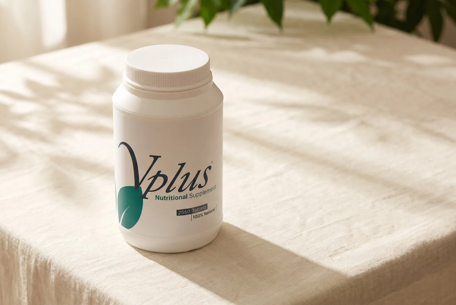 The Vplus Family tub of 2,560 tablets on a sunlit table