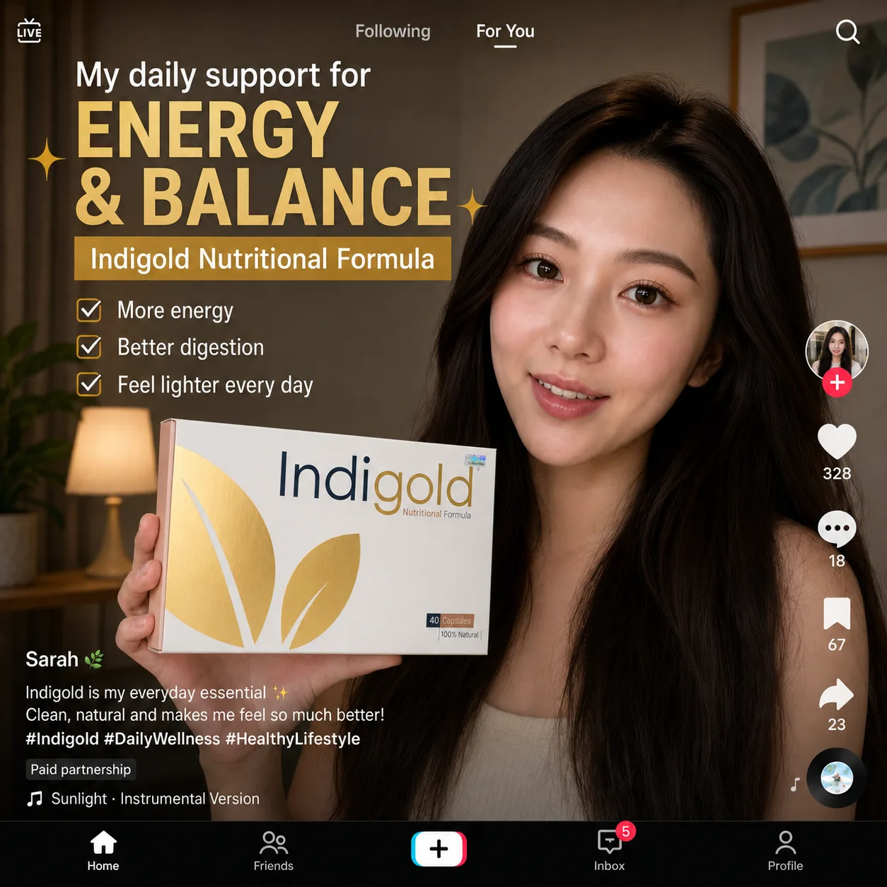 Sarah at home holding a box of Indigold Nutritional Formula